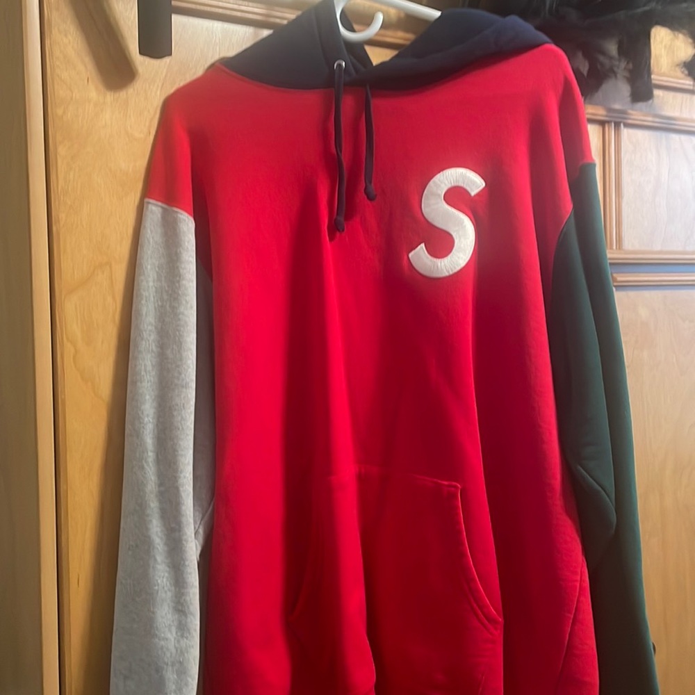 Supreme XL hoodie, stock x verified, red, green, grey, and blue.